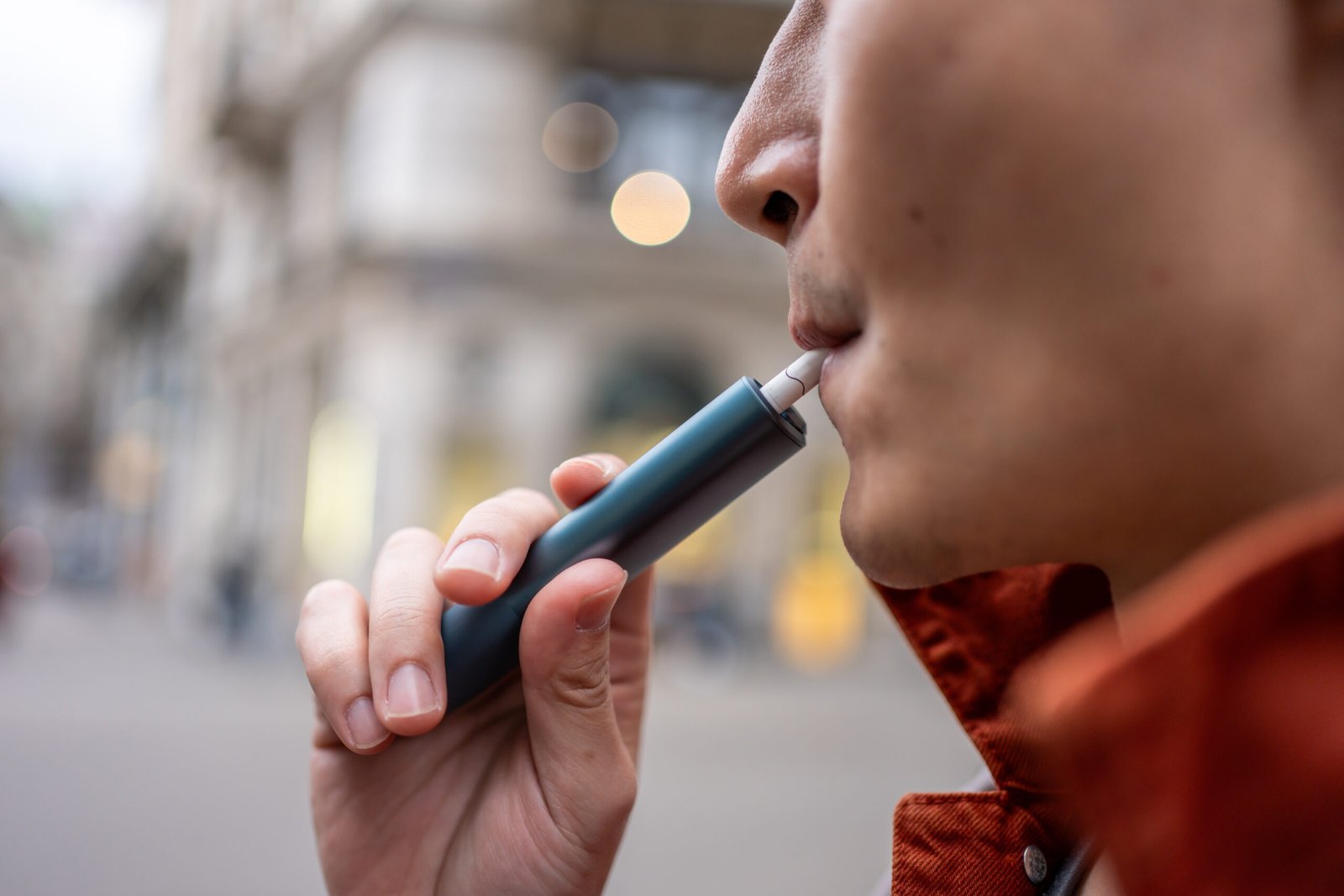 close-up-of-a-man-vaping-with-electronic-cigarette-2026-03-24-21-38-52-utc